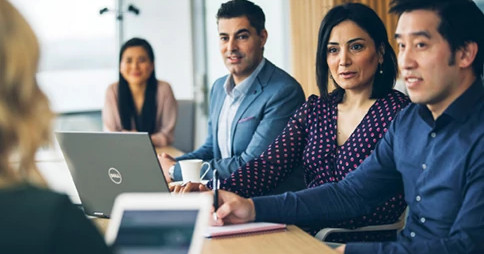 business-meeting-with-mixed-colleagues-and-laptops