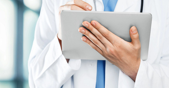 Doctor with tablet