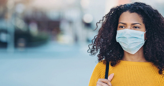 female-with-mask-avoiding-covid