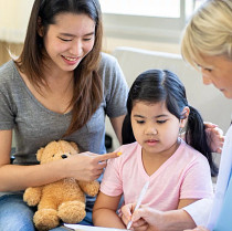 child, doctor and parent