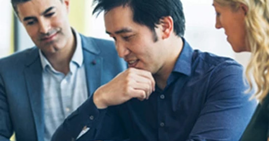 three-colleagues-working-on-ipad