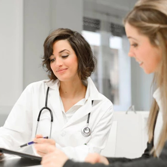 Two-female-doctors-reviewing-notes