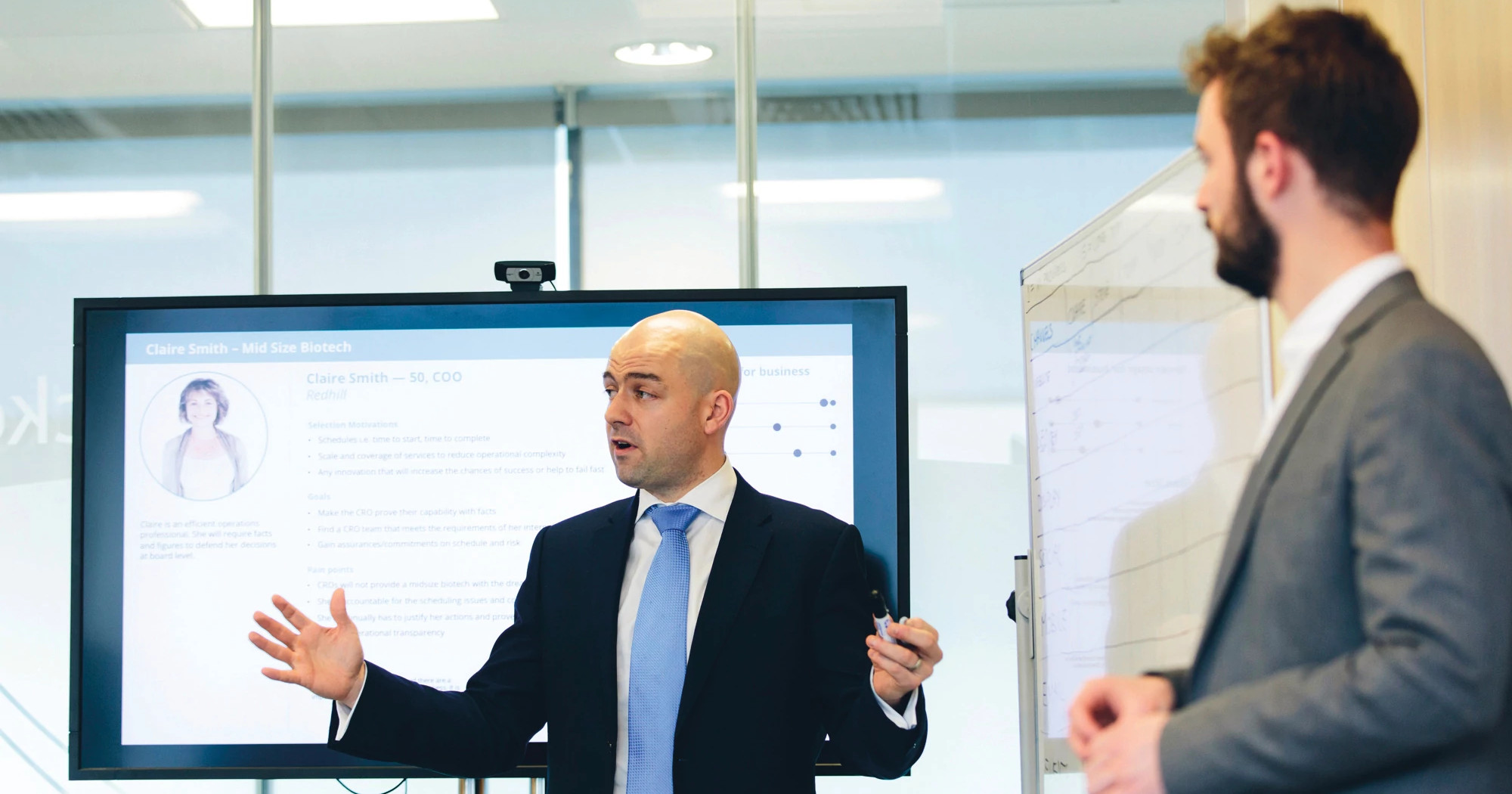 Two-men-giving-presentation-image Two-men-giving-presentation-image